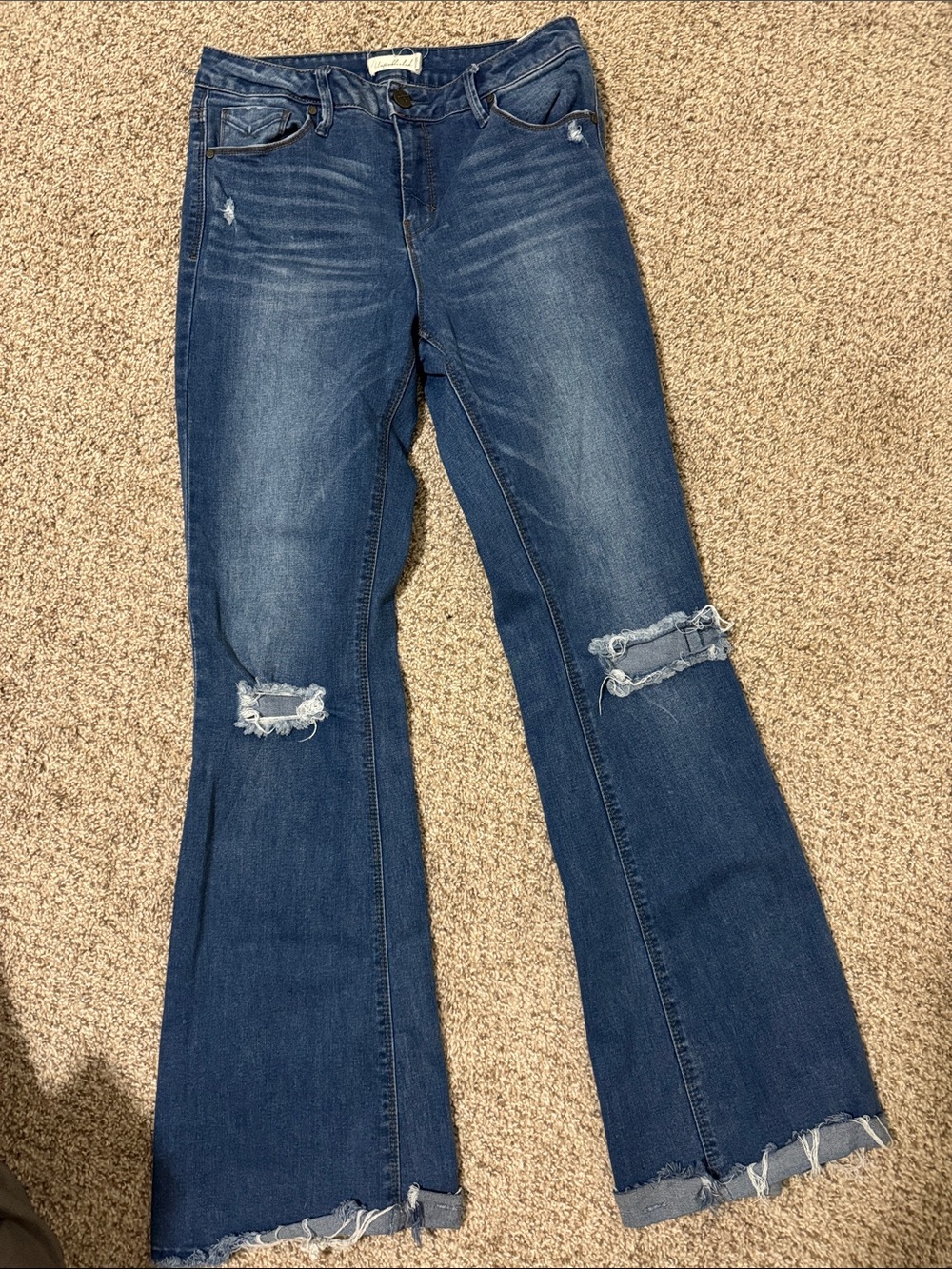 Distressed Dark Blue Flare Jeans with Raw Hem